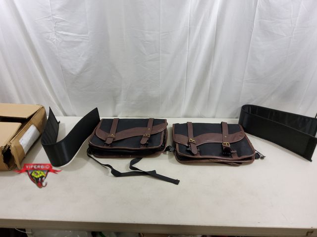 Lot 7-123479 - NICENC waxed canvas motorcycle saddlebags. Measurements 14 1/2" x 13".