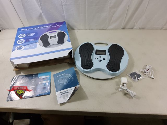 Lot 7-118162 - Electronic foot stimulator.  Powers on. Model WY-375.