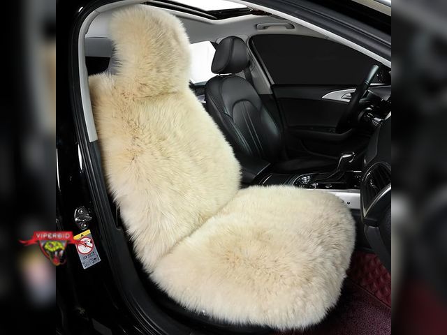 Lot 7-130227 - Retail value $69! New! Ogland universal fluffy front car seat cover.