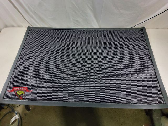 Lot 7-134322 - 47" X 31-1/4" Entrance mat with rubber back.