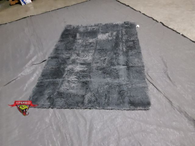 Lot 7-134034 - 5 ft. X 7 ft. Faux Fur Area rug.