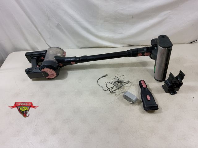 Lot 7-130112 - Gently used- Tested - Works. Trucozie cordless vacuum cleaner. Model T351.