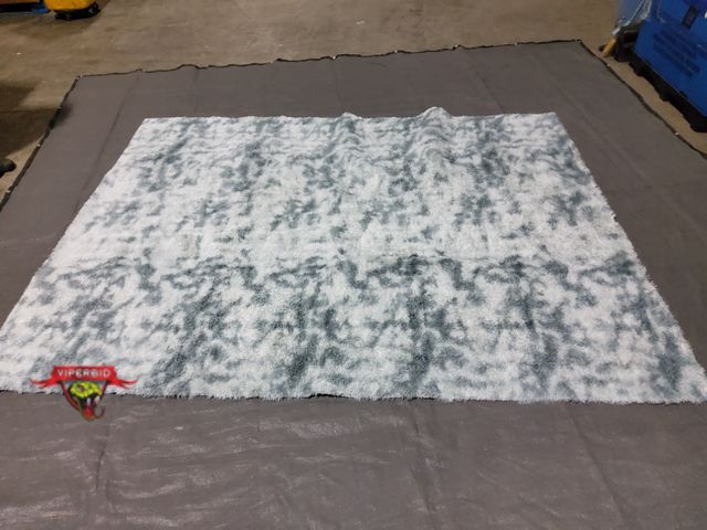 Lot 7-131865 - 8 ft. 1" X 10 ft. 2" Faux Fur Area rug.
