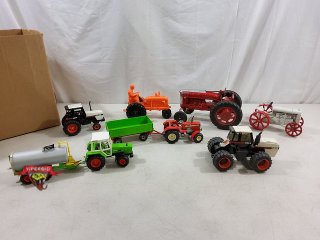 Lot 7-123807 - Mostly Vintage! Lot of assorted die-cast metal tractors / tractor accessories.