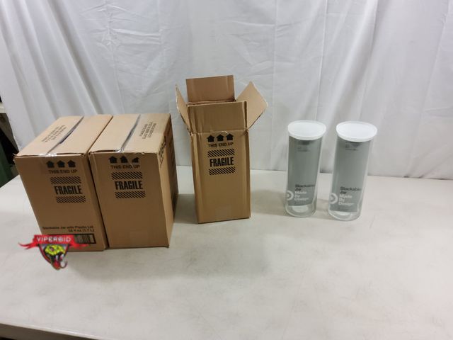 Lot 7-123398 - New! (6) Stackable  58 fl. oz. glass jars with plastic lids.
