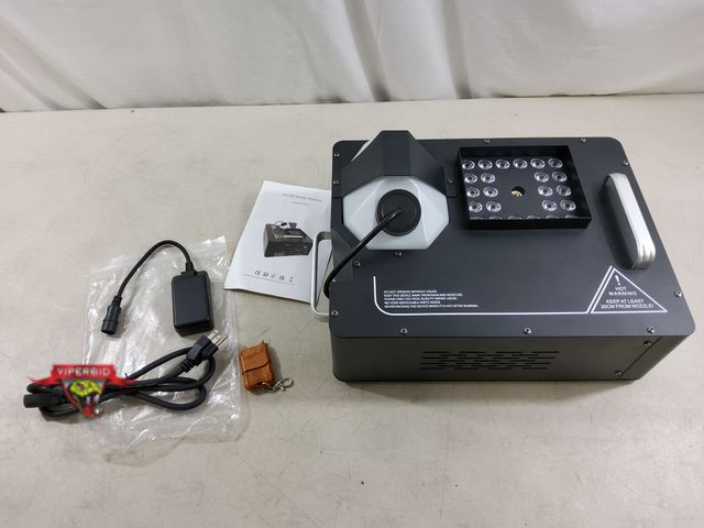 Lot 7-134603 - Smoke Machine with LED Lights. (15-1/2"L x 12"W x 7-1/2"T)