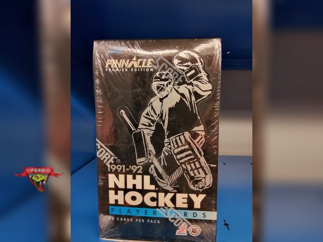 Lot 7-132713 - Sealed. Score Pinnacle 1991-'92 NHL Hockey card hobby box. 12 cards per pack. 36 packs.