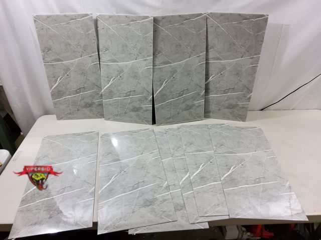 Lot 7-131034 - New! (10) Peel and stick wall panels. 11-7/8" X 23-5/8".