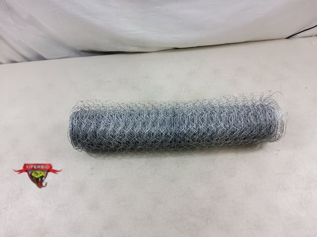 Lot 7-130773 - Roll of mesh wire fencing. Length unknown. 24". Roll is approximately 5" in diameter.