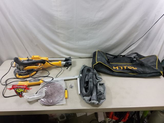 Lot 7-130259 - Used - Needs some cleaning! Mytol drywall sander. Tested to power on - spins - light works.