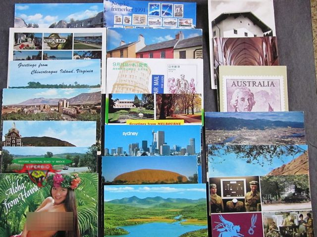 Lot 7-132516 - (50) postcards from many world countries, including the USA, and most with stamps.