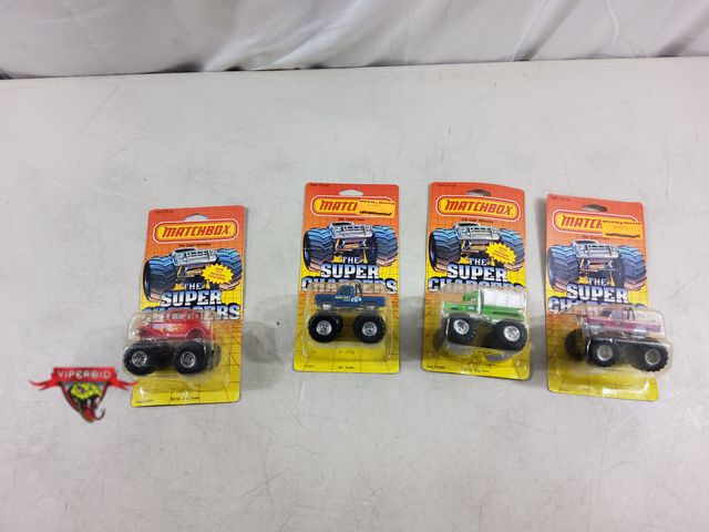 Lot 7-121298 - Vintage! New! (4) Matchbox The Super Chargers monster trucks.