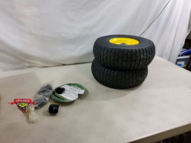 Lot 7-130730 - New! (2) Wiltire lawn mower wheels. 4-Ply rating. 15 X 6.00-6.