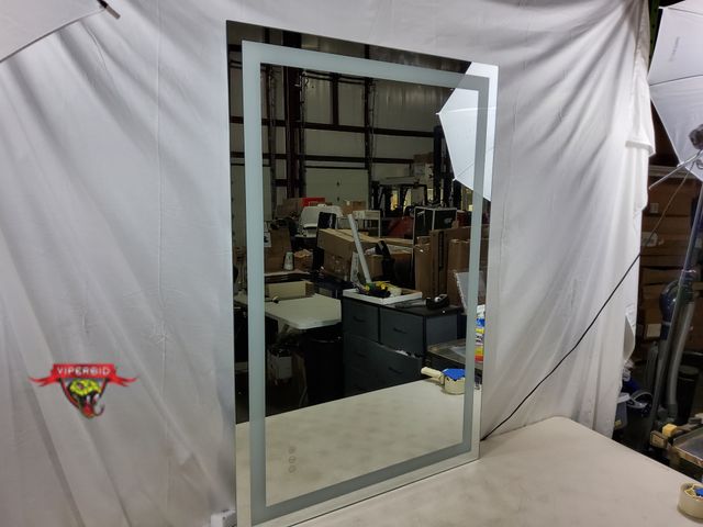 Lot 7-131880 - Briivue led plug-in mirror. 47" X 31".  Tested to light up.