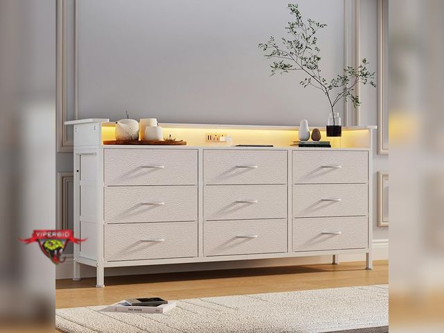 Lot 7-123691 - 9-drawer dresser with LED lights and charging station.
