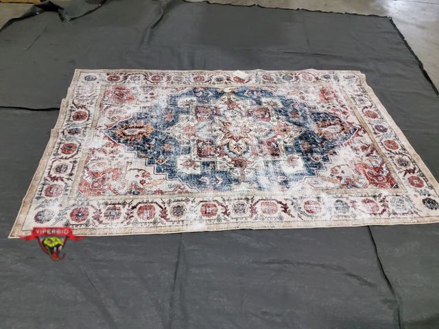 Lot 7-134503 - 6 ft. X 9 ft. Area rug.