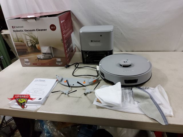 Lot 7-133333 - Redroad robot vacuum and mop. Model R11. Tested - vacuums.