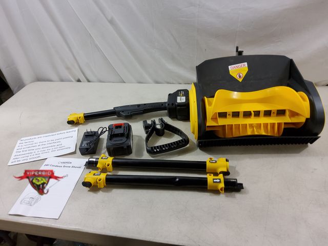 Lot 7-132801 - 24V Cordless snow shovel. Tested - Works. Note: 1 pole a tad dented (see pic). includes 2 batteries ...