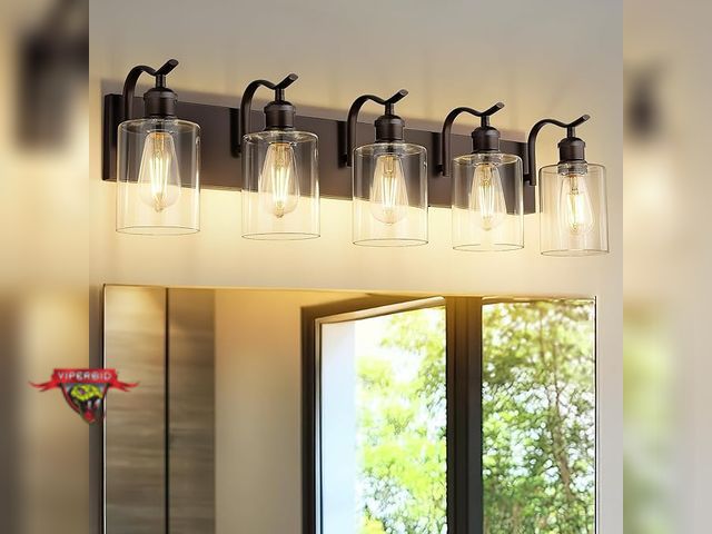 Lot 7-123744 - Jazava 5 Light Bathroom Vanity Light with clear glass globes. No bulbs included. 34.25''(L) x 7.48''...