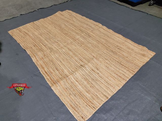 Lot 7-131696 - 6 ft. X 9 ft. Jute Area rug.