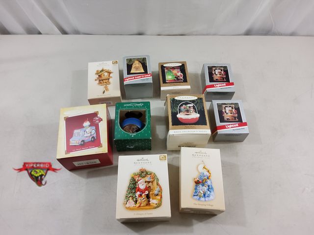 Lot 7-123623 - (10) Assorted Hallmark Lighted / Motion Christmas tree ornaments.