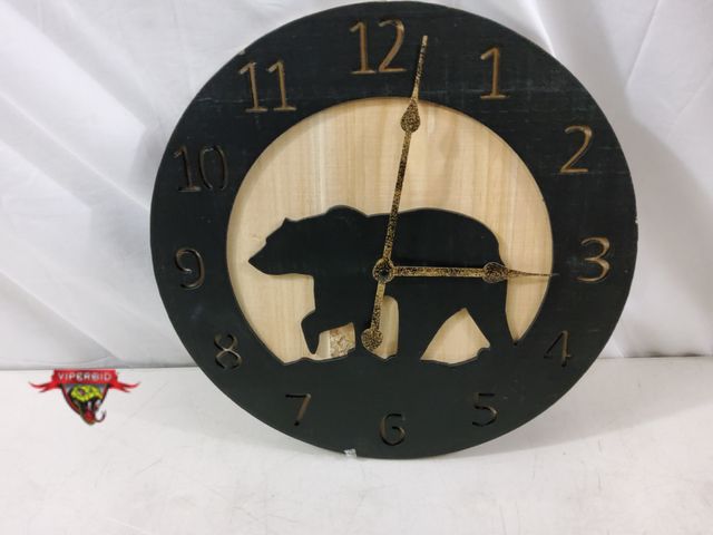 Lot 7-134139 - Young's Inc. wood bear carved battery operated wall clock. 14". Requires (1) AA Battery - not includ...