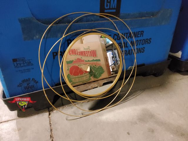 Lot 7-130102 - 23" Diameter decorative wall mirror.