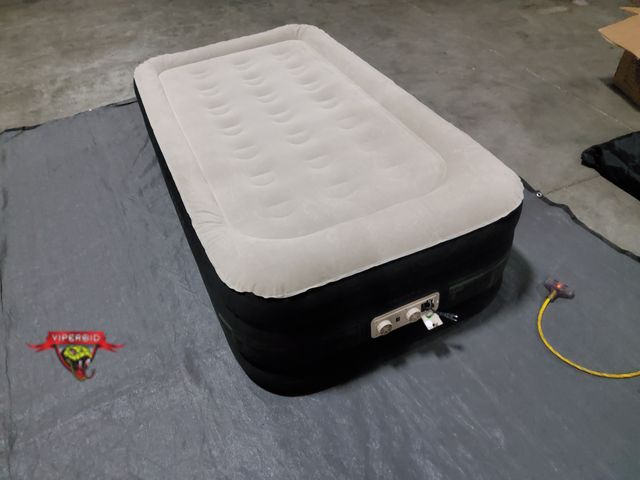 Lot 7-135876 - King Coil twin size air mattress with built-in pump. 20"H.
