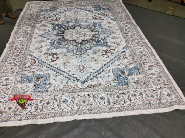 Lot 7-131747 - 9 ft. X 12 ft. Area rug.