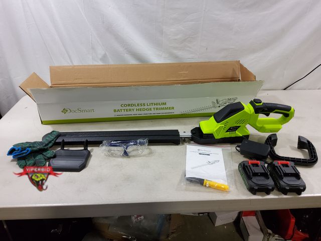 Lot 7-131233 - DocSmart HT02-G cordless lithium battery hedge trimmer with (2) Batteries and charger. Tested.