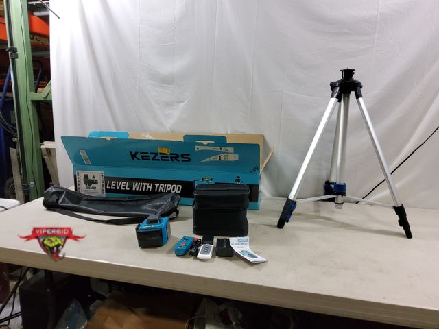 Lot 7-132969 - Kezers self leveling laser level with tripod stand. Model K36G. Tested to power on.