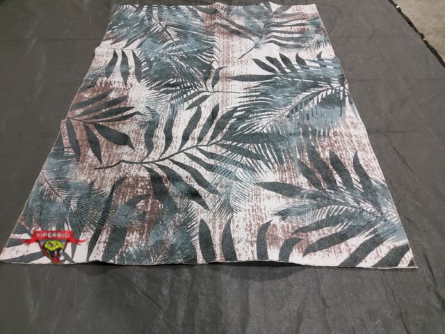Lot 7-131026 - 6 ft. 1" X 8 ft. 6"  Outdoor rug.
