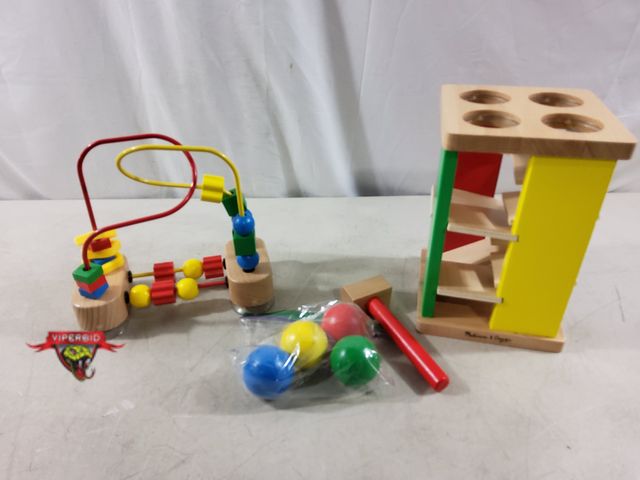 Lot 7-135609 - Melissa &amp; Doug pound &amp; roll tower &amp; a Melissa &amp; Doug First Bead maze.