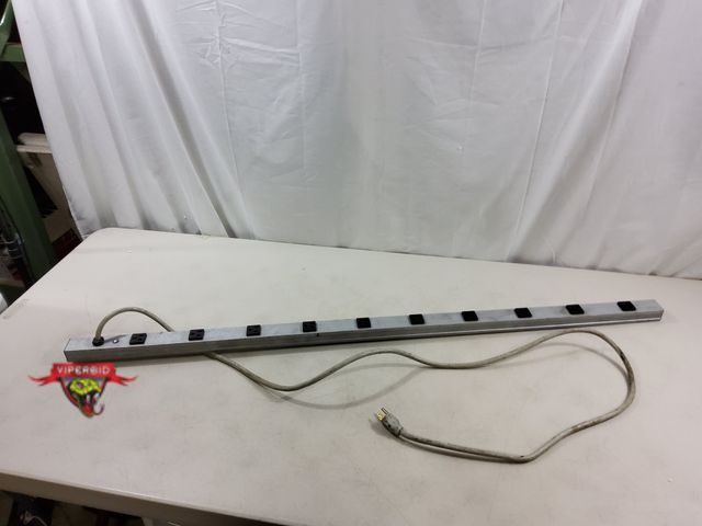 Lot 7-123740 - Brooks. Mfg. 10-Port power distribution unit. 4 ft. long.
