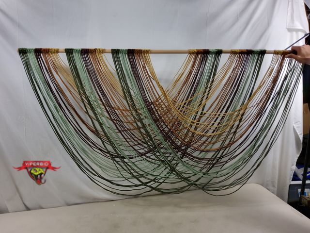 Lot 7-130336 - New! Flber macrame wall hanging. 57"W X 31"L.