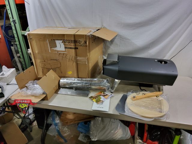 Lot 7-133432 - Retail value $279! mimiuo Tisserie W-Oven portable wood pellet pizza oven. Item no. F-BRK6074-BK1.
