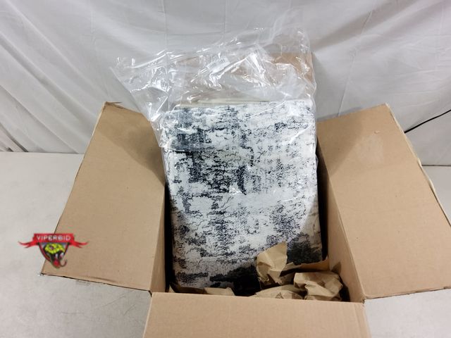 Lot 7-132863 - 6 ft. X 9 ft. Grey / black area rug.