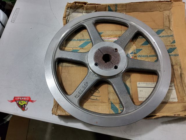 Lot 7-133951 - Wheelabrator cast iron sheave pulley with taplered split bushing assembly. Overall diameter: 15-3/4"...