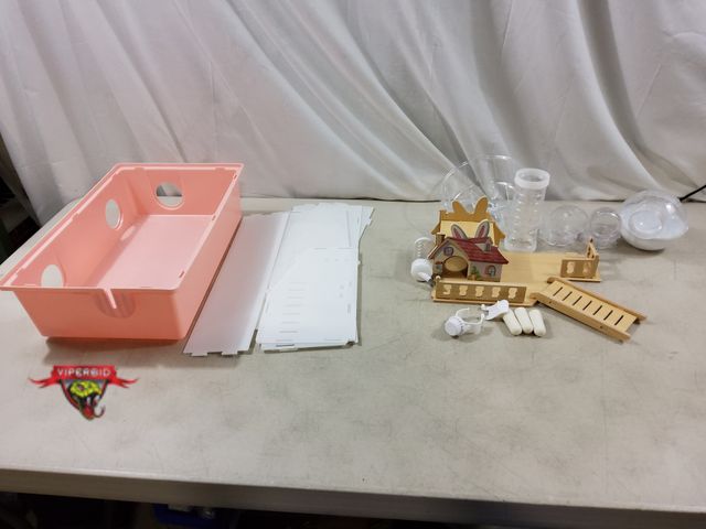 Lot 7-132528 - Hamster starter set with wheel, tunnel and water bottle. Appears complete - needs to be set up.
