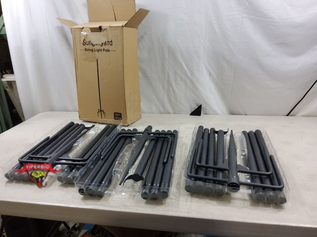 Lot 7-134099 - Box of 3 - Sungaryard 10 ft. string light poles.