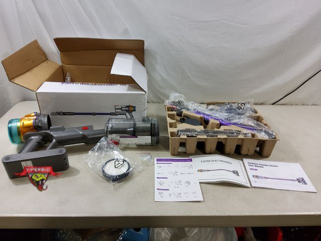 Lot 7-133102 - Cordless vacuum cleaner. Model P11.  Very lightly used! Tested to power on.