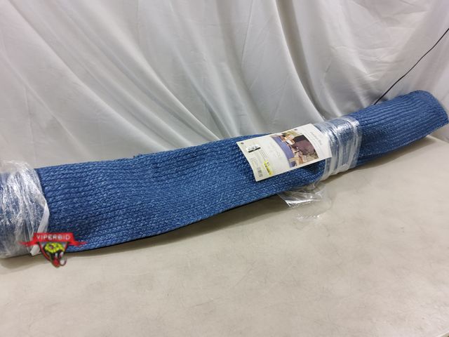 Lot 7-132822 - 5 ft. X 7 ft. Outdoor area rug.