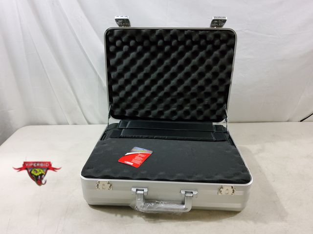 Lot 7-133179 - Travel Sentry TSA lock metal briefcase with removable foam inserts. 18-3/4" X 14" X 6-1/6".