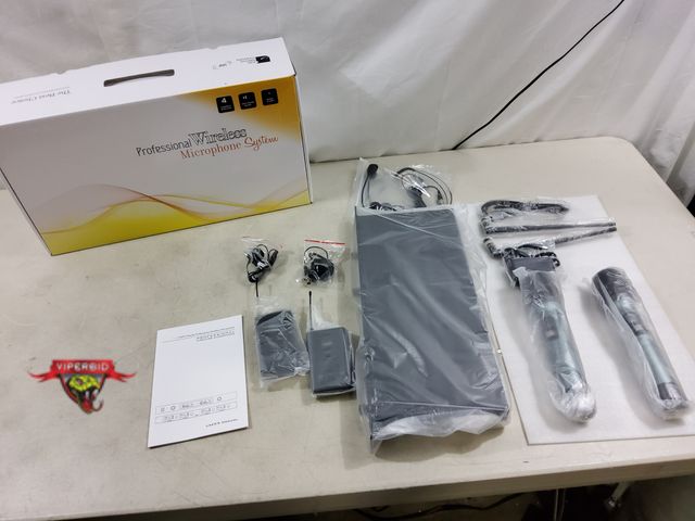 Lot 7-130268 - 4-Chanel professional wireless microphone system.