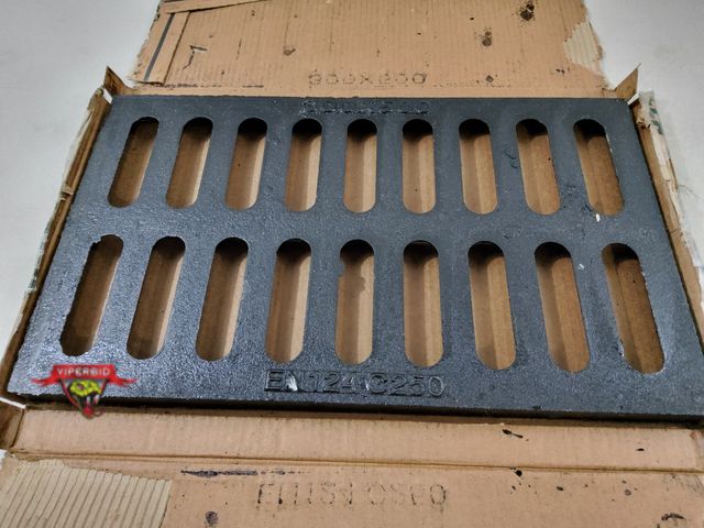 Lot 7-130566 - Retail value $55. Natotela Ductile Iron Driveway Drain Grate-20" x 12".