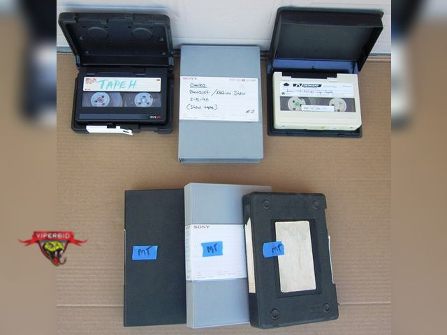Lot 7-132519 - Three vintage local TV station video tapes and three empty video tape boxes. One or two may be of a ...