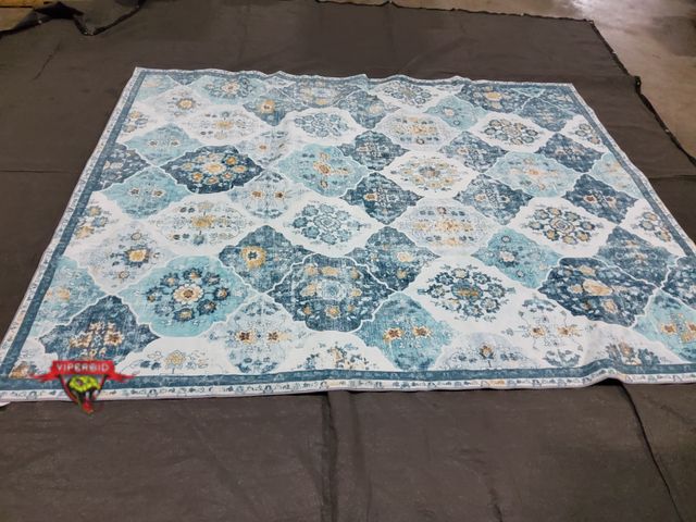 Lot 7-134413 - 8 ft. X 10 ft. Area rug.