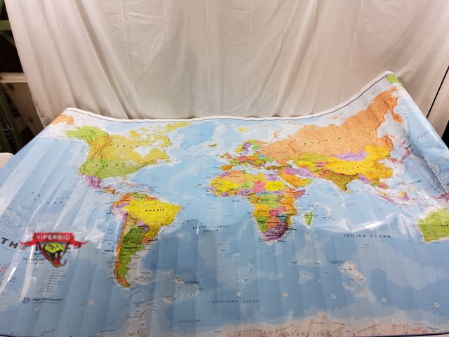 Lot 7-123719 - Plastic world map. Approximately 46" X 79".