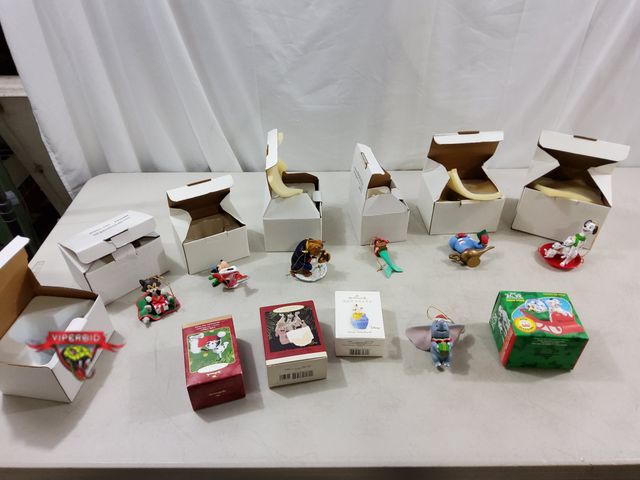 Lot 7-123738 - (10) Disney Christmas tree ornaments and a Disney 101 Dalmations McDonald's Christmas snowglobe.