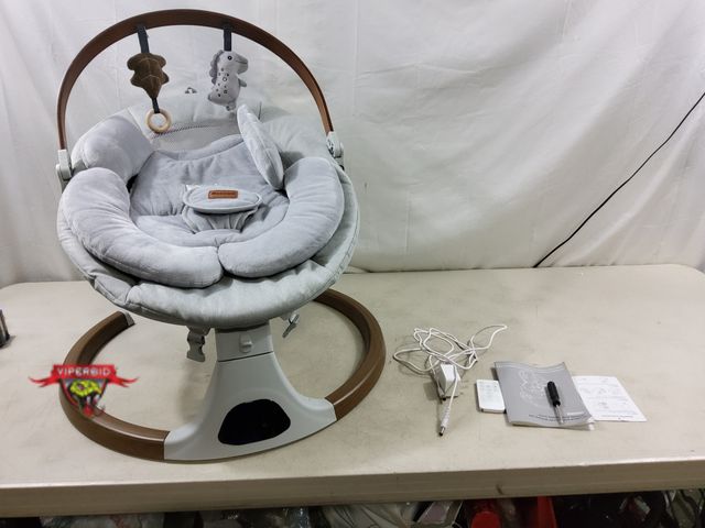 Lot 7-130762 - Monamii baby swing with music and remote. Bluetooth capability. Model BB2007.